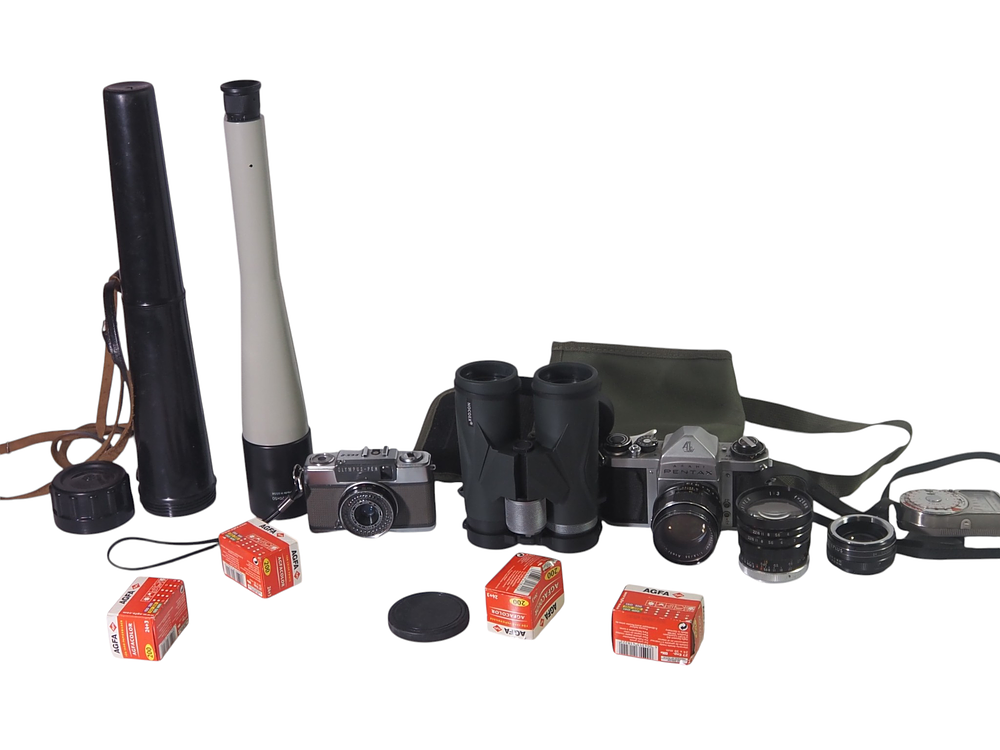 Lot 12: Mixed Camera Collection and Olympus Pen Pentax Lenses Binoculars Telescopes Film And Accessories