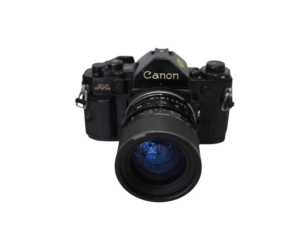 Lot 28: Canon A1 Black 35mm SLR Camera with Tamron 35 70mm Zoom Lens
