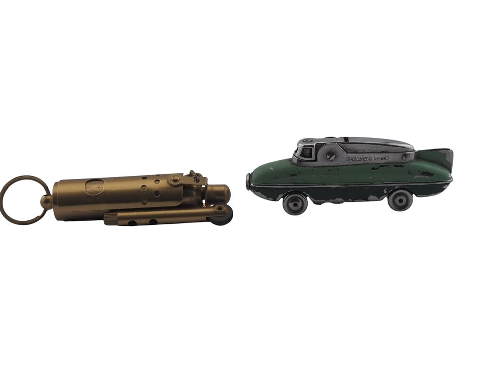 Lot 205: Sarome Blue Bird Car Lighter and Brass Trench Style Lighter