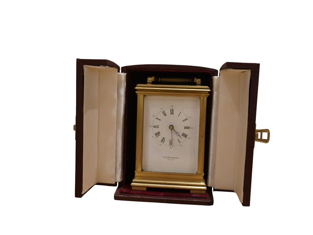 Lot 193: Taylor and Bligh England Brass Carriage Clock