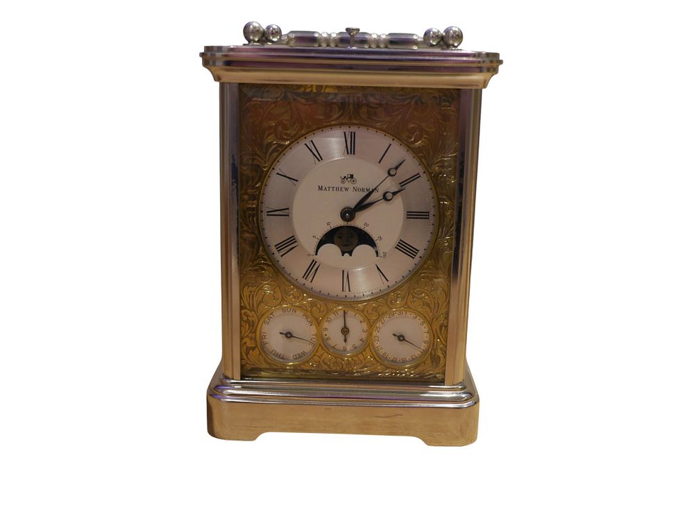 Lot 194: Matthew Norman Switzerland Carriage Clock with Moon Phase and Calendar