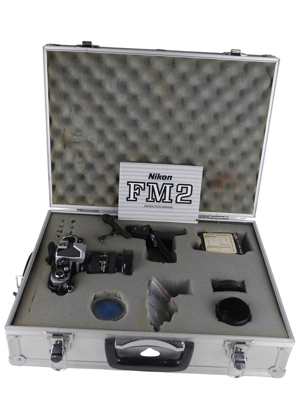 Lot 54: Nikon FM2 Camera with 28 70mm Lens Accessories and Aluminium Case