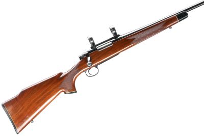 REMINGTON
A MODEL 700 .17 REM BOLT ACTION RIFLE Ser No C6221458; High gloss finished stock, 