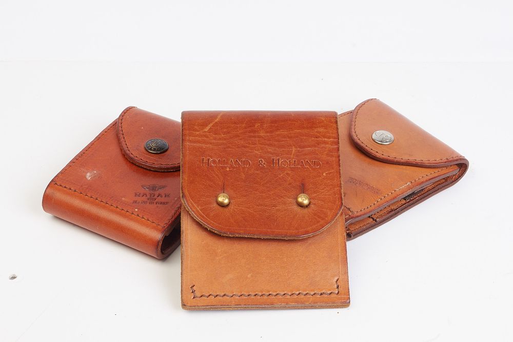Lot 685: 3 x leather cartridge pouches. Holland Holland ,...