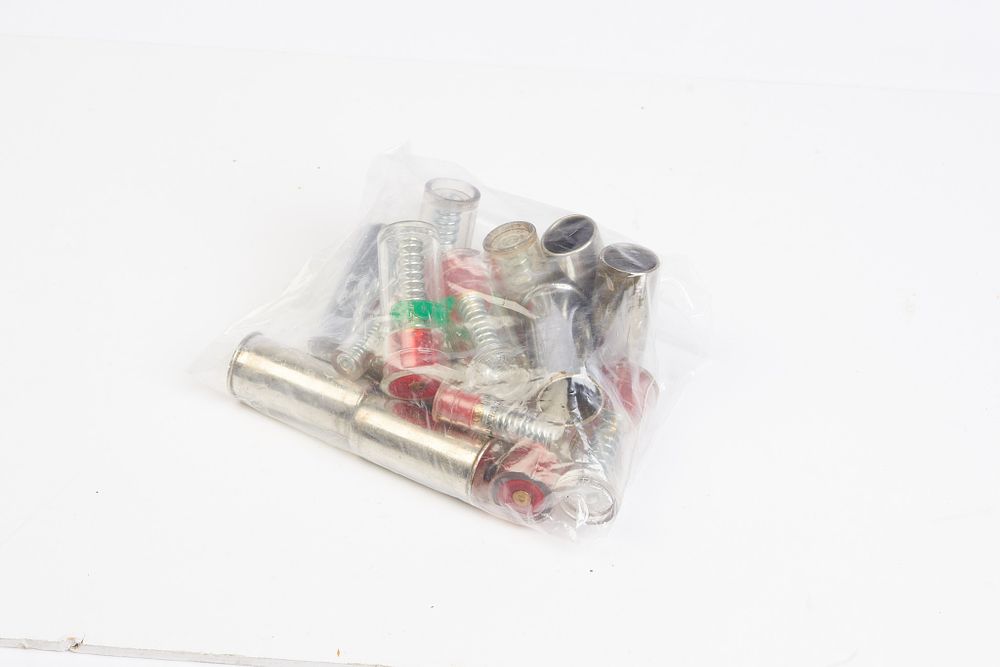 Lot 687: Bag of mixed size snap caps. 12/16/.410