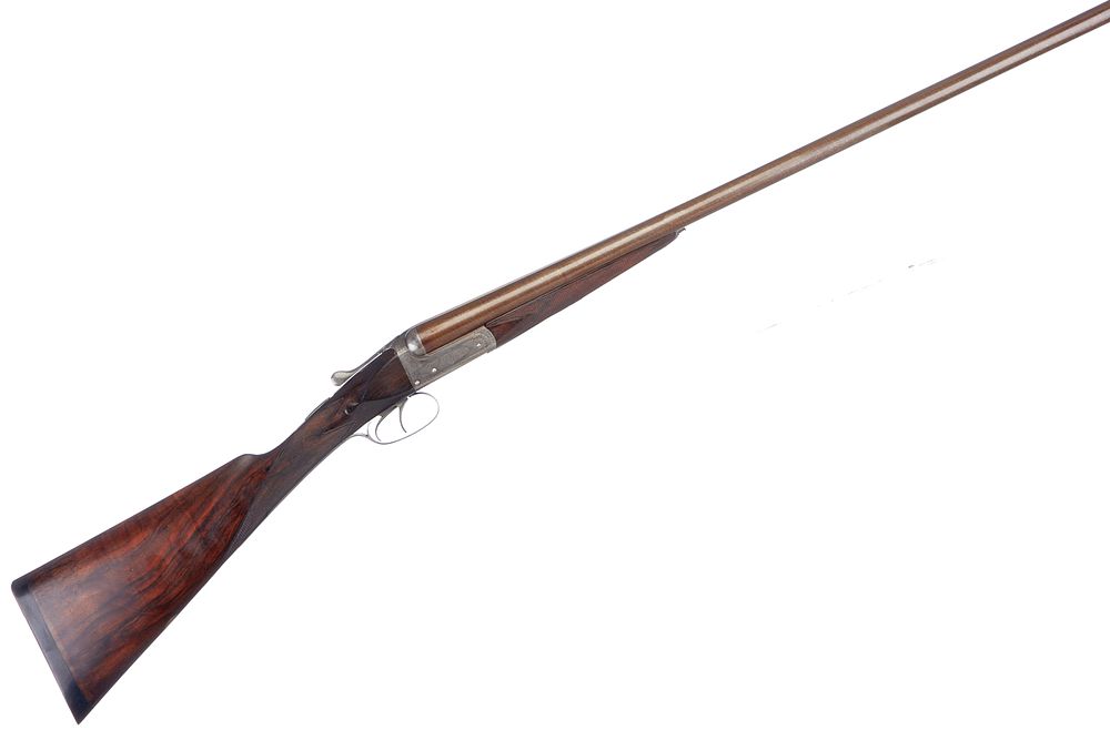 Lot 240: F RHODES
A 12-BORE SIDE BY SIDE SER NO 43873