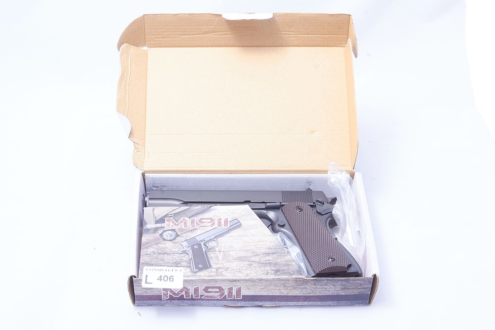 Lot 406: KWC
A .177 CAL. KWC M1911 AIR PISTOL. 
Ser No 19B33880.