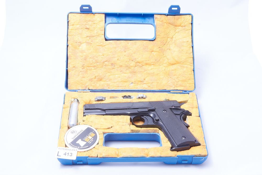 Lot 413: COLT
A .177 CAL. COLT GOVERNMENT 1911 A1 AIR PISTOL. 
Ser No F32311128.