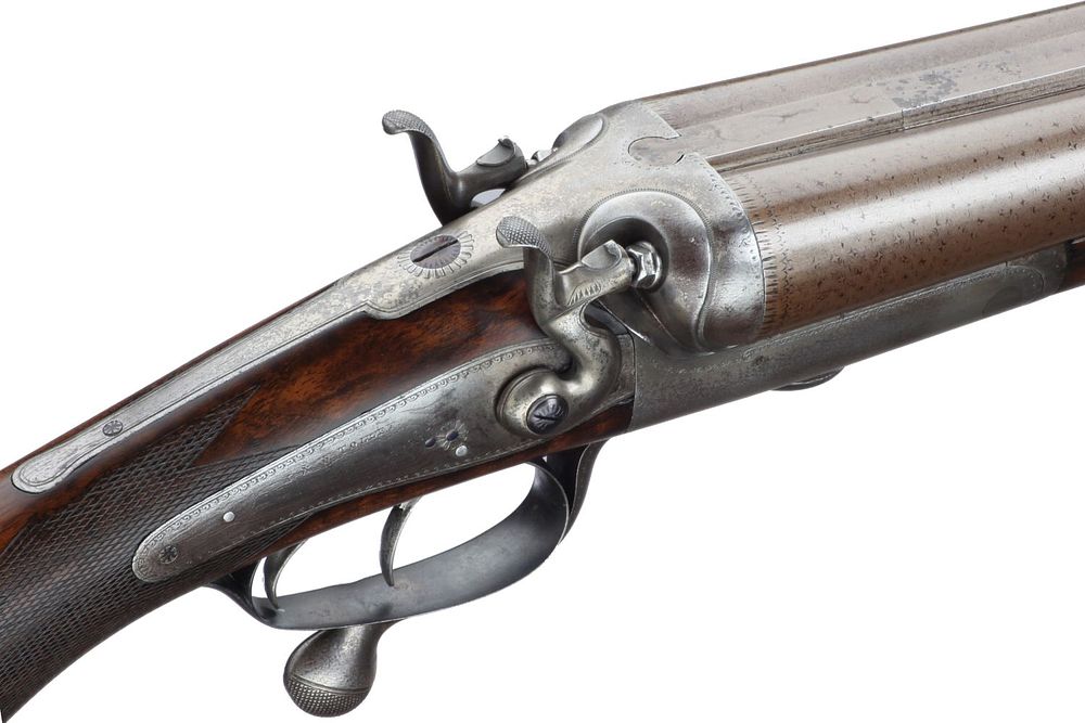 Lot 491: J&W TOLLEY
A 10-BORE DAMASCUS BARRELLED ROTARY UNDERLEVER HAMMER ACTION Ser No 6697