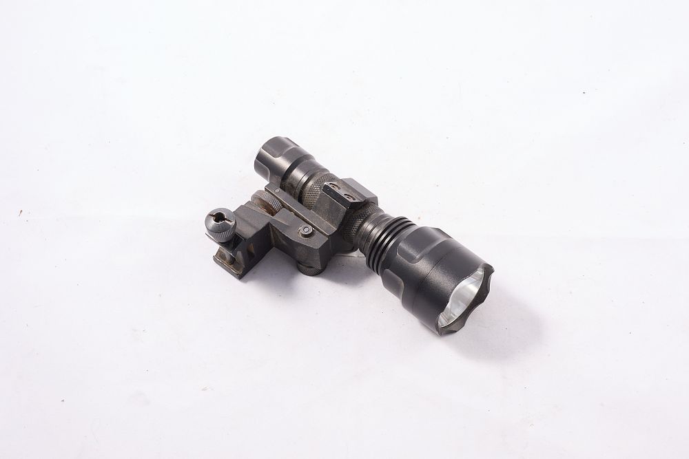 Lot 523: NVM, BRIGHT TORCH WITH ADJUSTABLE WEAVER MOUNT