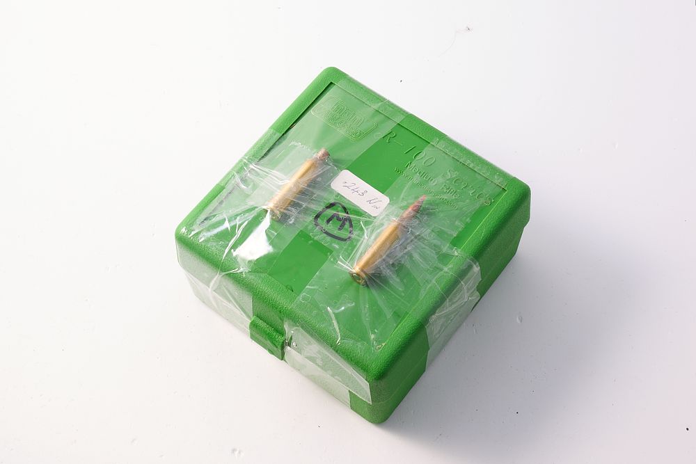 Lot 1341: 75 ROUNDS OF .243 WINCHESTER 75 GR HORNADY V-MAX AMMUNITION IN BRAND NEW LAPUS BRASS CASES. ALSO 34 PREPPED AND PRIMED MATCHING LAPUA CASES. ALONG WITH GREEN 100 ROUND CAPACITY MTM CARRY / STORAGE CASE.