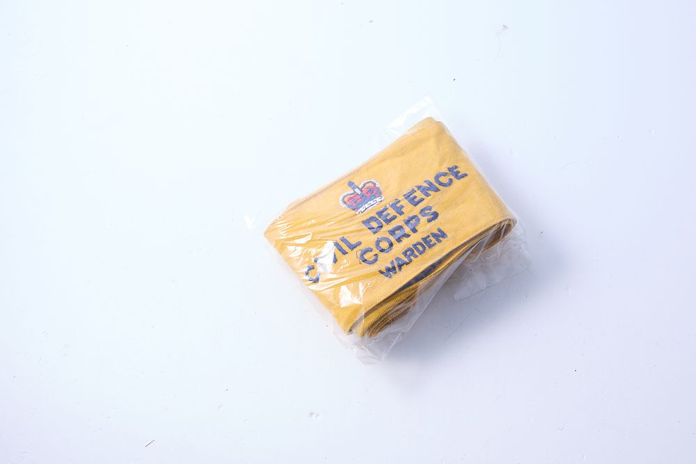 Lot 1323: BATCH OF 5 WWII VARIOUS VINTAGE DEFENCE CORPS ARM BANDS. ONE SIMPLY DETAILED DEFENCE CORPS. THE OTHER FOUR THE SAME BUT ONE: RESCUE. SECOND: WELFARE. THIRD: HEAD QUARTERS AND THE LAST WARDEN
