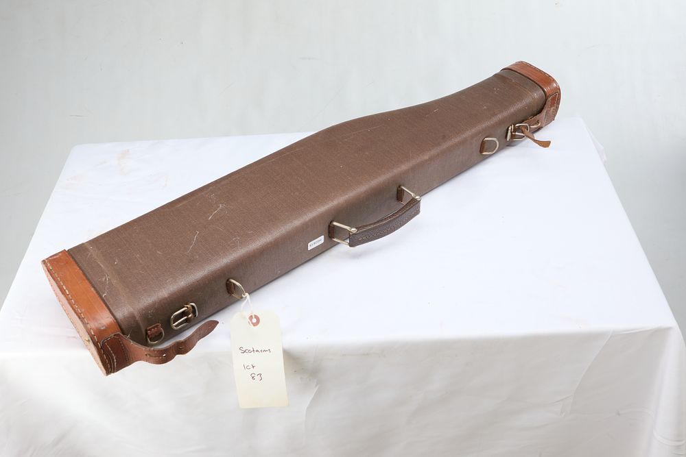Lot 1100: A BROWN COVERED LEG-O-MUTTON GUN CASE WITH BLUE BAIZE LINING.