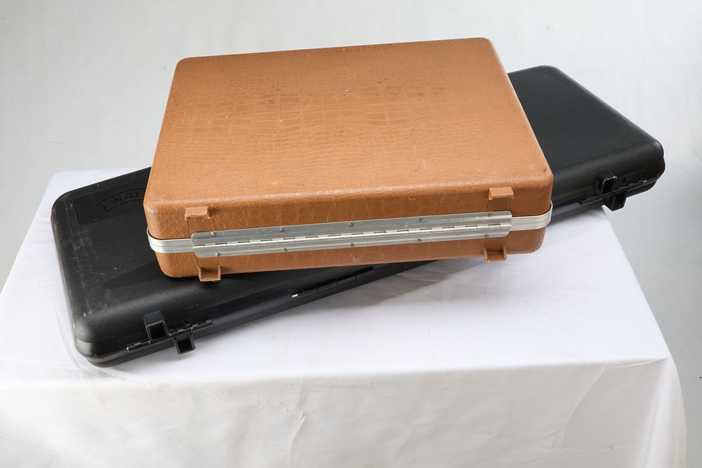 Lot 1099: AN ALLIGATOR SKIN CASE AND A WALTHER HARDSHELL GUN CASE