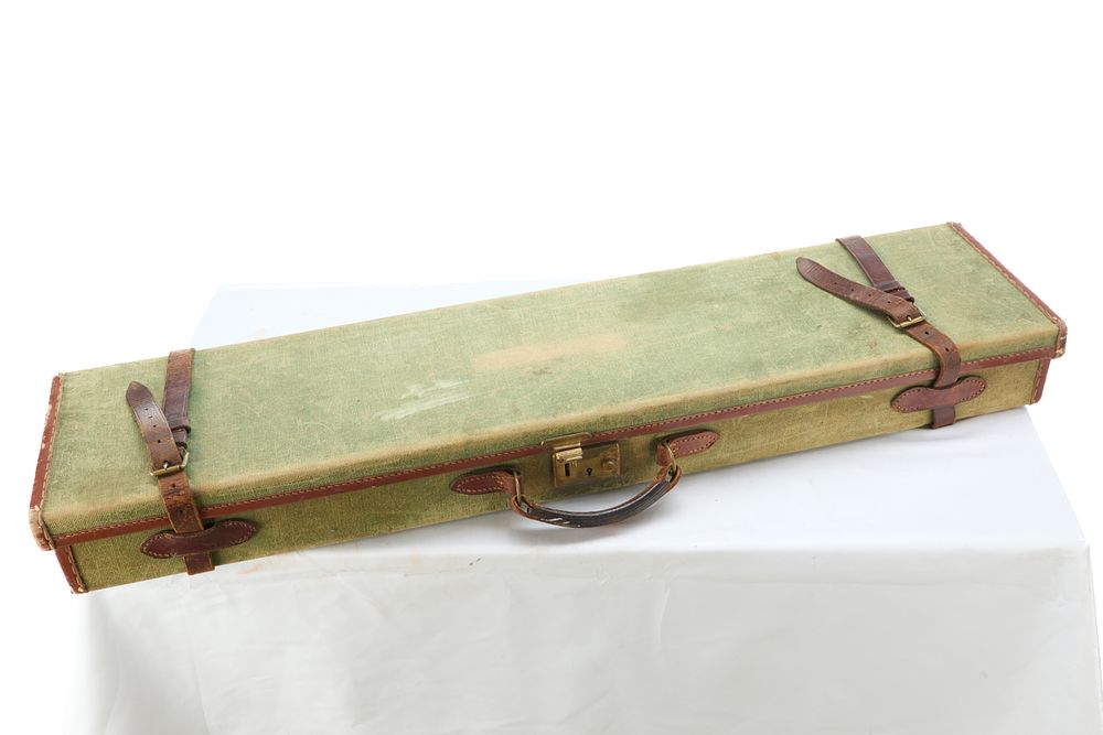Lot 1076: CANVAS SHOTGUN CASE W/ LOCK AND STRAPS