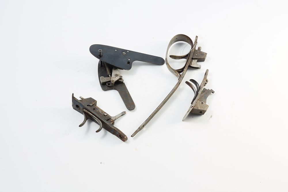 Lot 605: LOT OF SIDELOCKS, TRIGGER GROUPINGS, AND TRIGGER GUARDS
