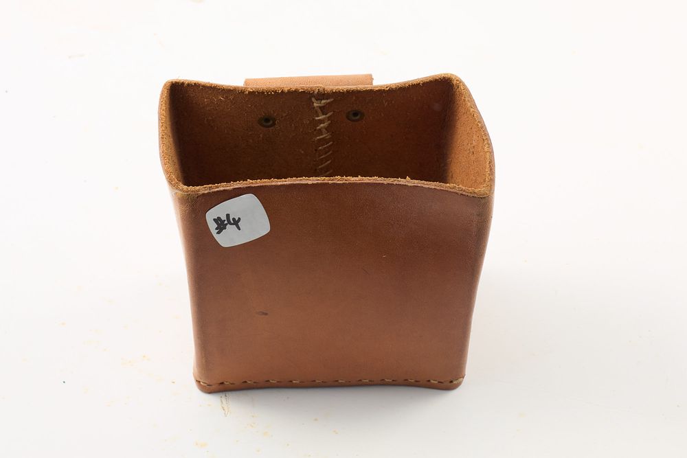 Lot 103: Leather Shotgun Cartridge holder;