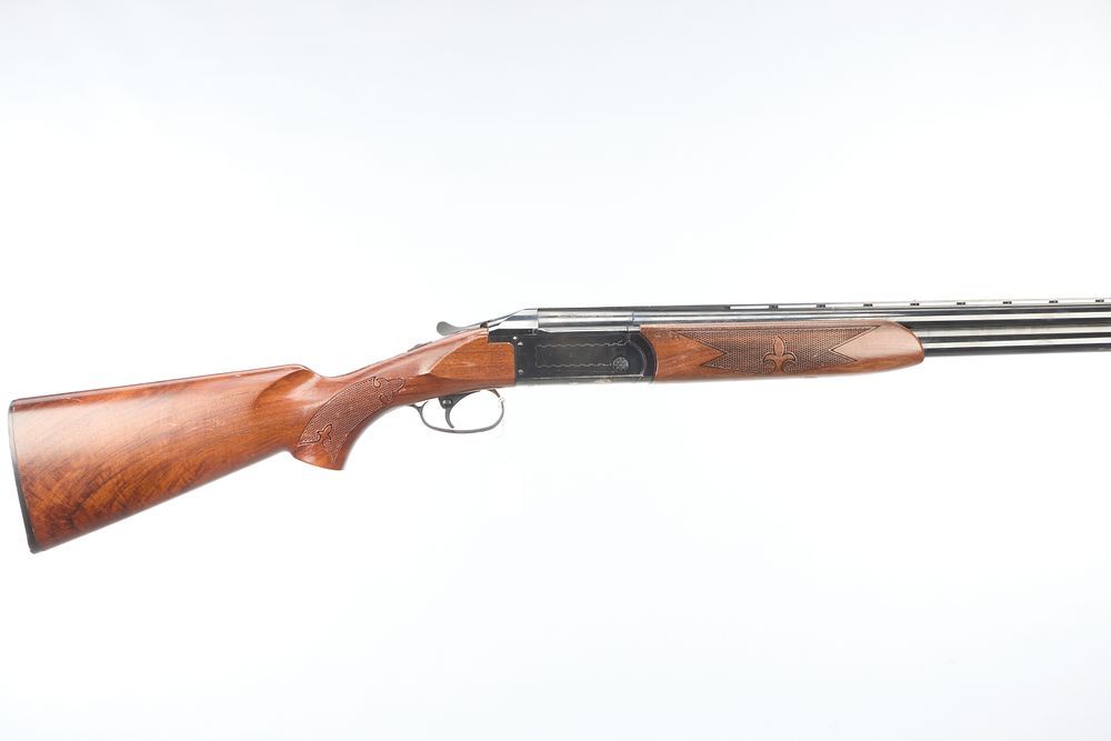 Lot 319: VALMET A 12 BORE OVER & UNDER NON EJECTOR Ser No 57156