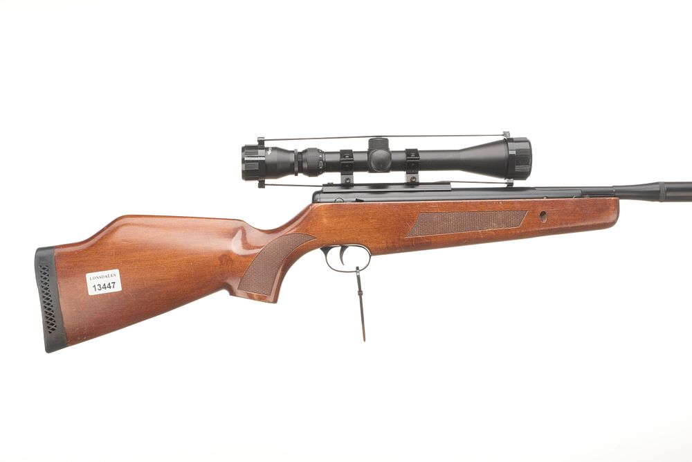 Lot 525: BSA A Mod LIGHTENING .22 BREAK BARREL WITH MODERATOR AND NIKKO & STERLING SCOPE Ser No S43744