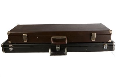TWO LEATHER CASES, WITH METAL EDGING AND CORNERS