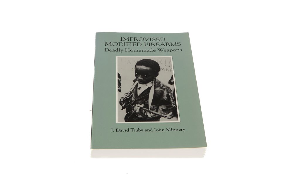 Lot 692: IMROVISED MODIFIED FIREARMS DEADLY HOMEMADE WEAPONS Y J. DAVID TRUBY AND JOHN MINNERY