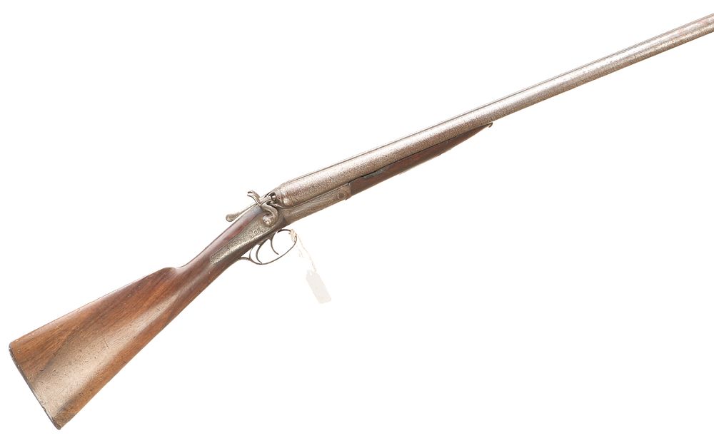 Lot 556: NVM
 THE S, F AND A OF A 12-BORE SHOTGUN Ser No 28260