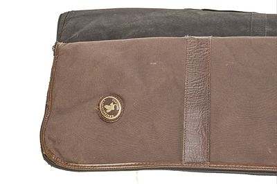 TWO RIFLE SLIPS;. One faux leather and one nylon.
