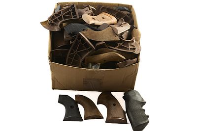 A QUANTITY OF MAINLY REVOLVER GRIPS - PLASTIC AND WOODEN;