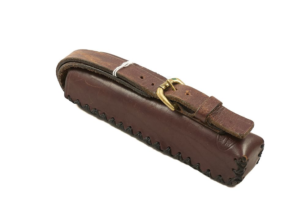 Lot 58: LEATHER BOLT CARRIER;
