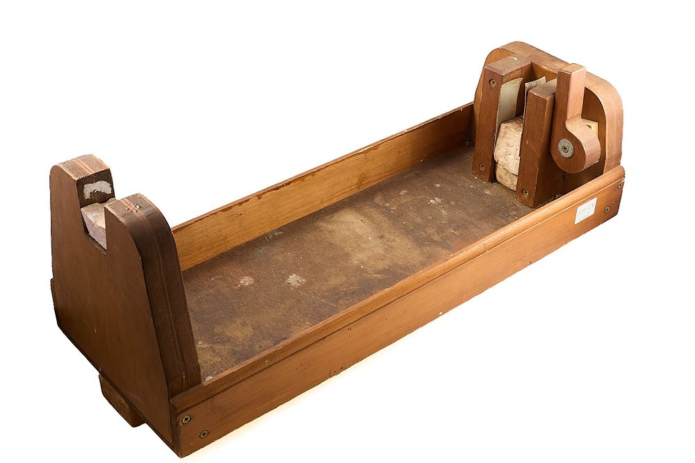 Lot 65: WOODEN GUN REST;