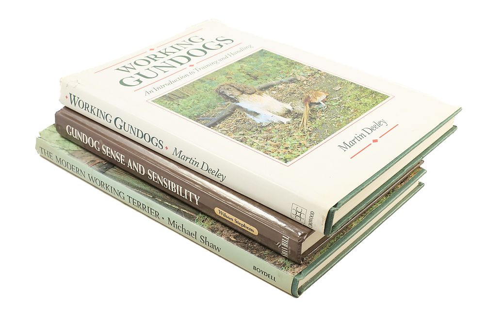 Lot 102: THREE BOOKS ON WORKING DOGS;