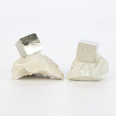 2 Pyrite Mineral Cubes in Matrix. Group of two Pyrite mineral cubes in a stone matrix. (Each)