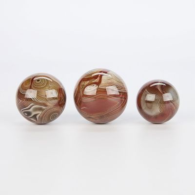 Grp 3 Sardonyx Banded Agate Polished Spheres. Group of three Sardonyx banded agate stone