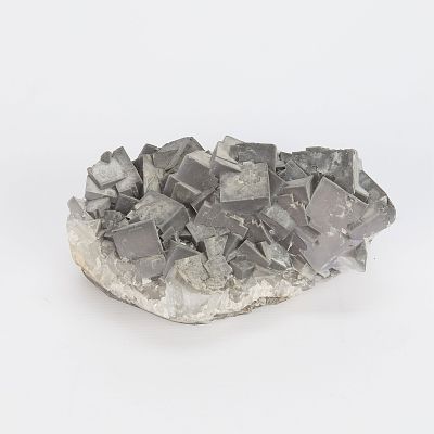 Fluorite Mineral Crystal from Hunan Province, China. Segment of gray/blue cubic fluorite mineral