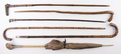 7 Vintage Canes & Umbrella. Group of seven vintage canes and one umbrella. Height ranges from