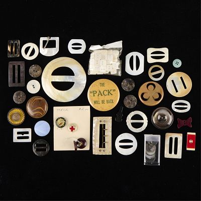 Group of Assorted Buttons. Group of assorted buttons of various sizes and materials. Height