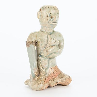Antique Southeast Asian Pottery Figure. Antique Southeast Asian pottery figure. The figure