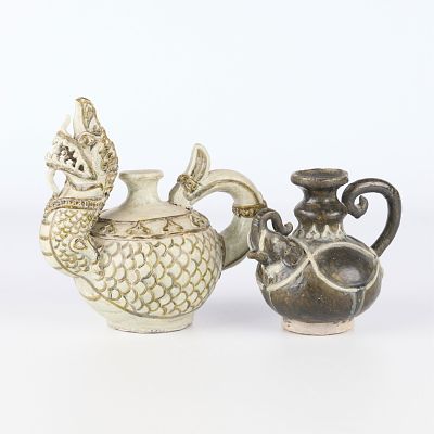 2 Thai Animal Ewers. Two Thai ceramic animal form ewers. One in the form of an elephant and the
