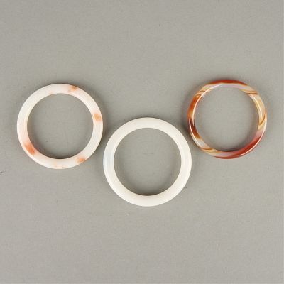 3 Chinese Jade Bangles. Group of three Chinese jade bangles. Inner diameter ranges from 2 1/4 