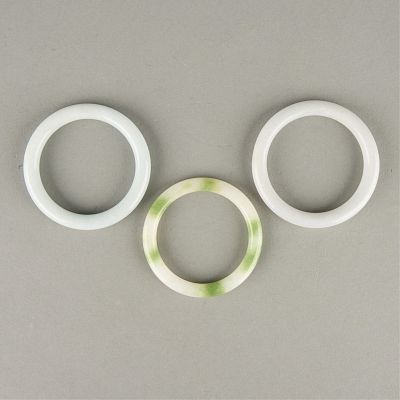 3 Chinese Jade Bangles. Group of three Chinese jade bangles. Inner diameter ranges from 2 1/4 