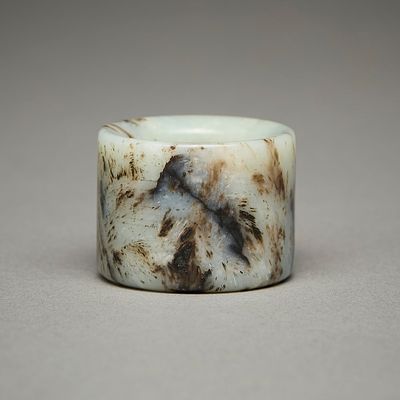 Carved Chinese Jade Archer's Ring. Chinese carved jade archer's ring with lovely striations of 