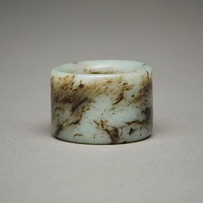 Carved Chinese Jade Archer's Ring. Chinese carved jade archer's ring with lovely striations of 