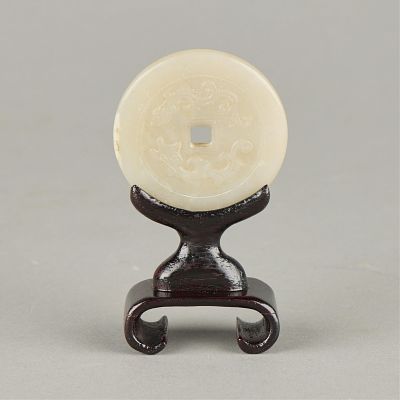Chinese Carved Jade Bi Disk w/ Stand. Chinese pierced and carved jade ritual bi disc or roundel 
