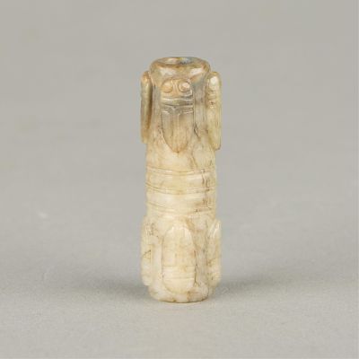 Chinese Carved Jade Cicada Cong Bead. Chinese carved jade cong bead. Of an oblong form 