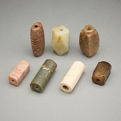 7 Chinese Carved Jade/Hardstone Cong Beads. Group of seven Chinese carved hardstone or jade cong 