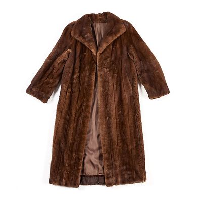 Brown Mink Fur Coat. Long brown colored mink fur jacket. Purchased from Schlampps Mpls. 
