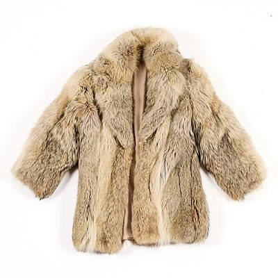 White & Gray Fur Jacket. Cream or white and gray colored fur coat, possibly composed of rabbit 