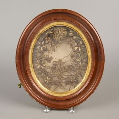 Victorian Hair Wreath. Ornate Victorian hairwork wreath. In the shape of flowers. In a frame. 