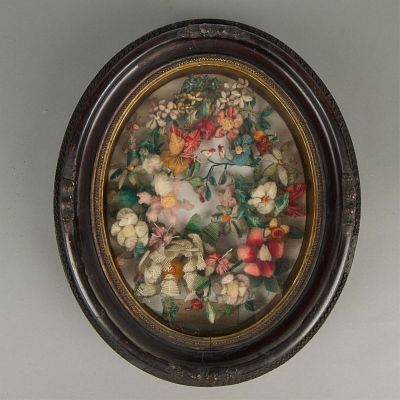 Victorian Wool Flower Wreath. Ornate Victorian wool flower wreath in an oval frame. With small 