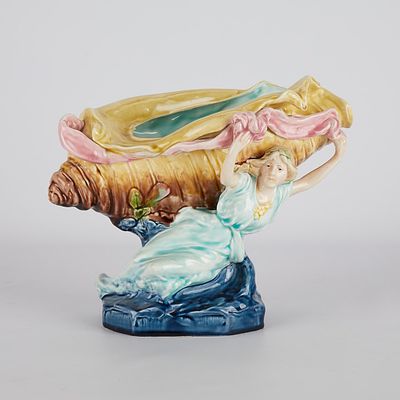 Porcelain Centerpiece Shell Vase w/ Woman. Porcelain centerpiece depicting a woman holding aloft 